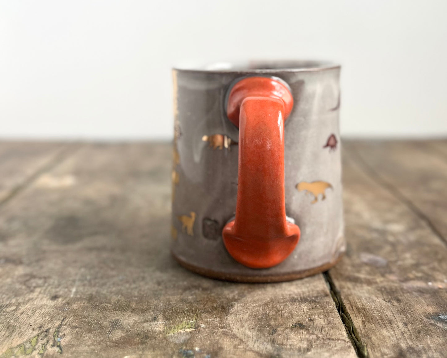 Mug with slip, gold decals and image transfer