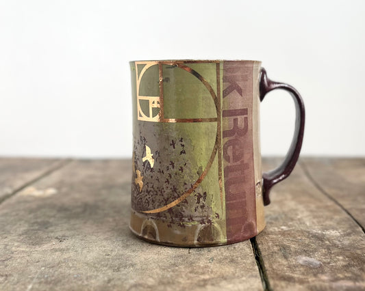 Mug with slip, gold decals and image transfer