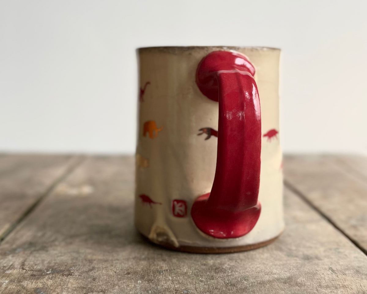 Mug with red handle, gold decals and image transfer