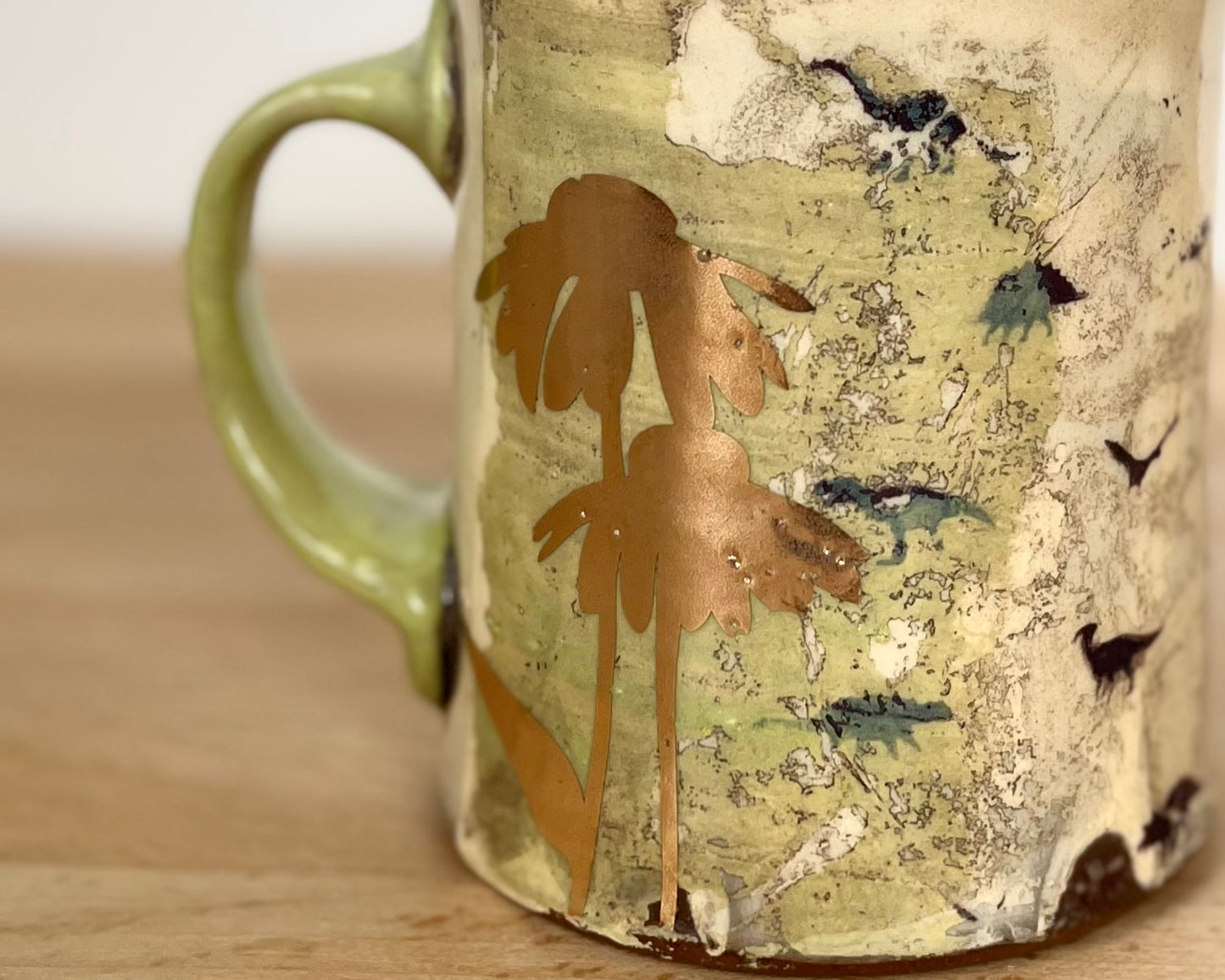 Mug with slip, gold decals and image transfer