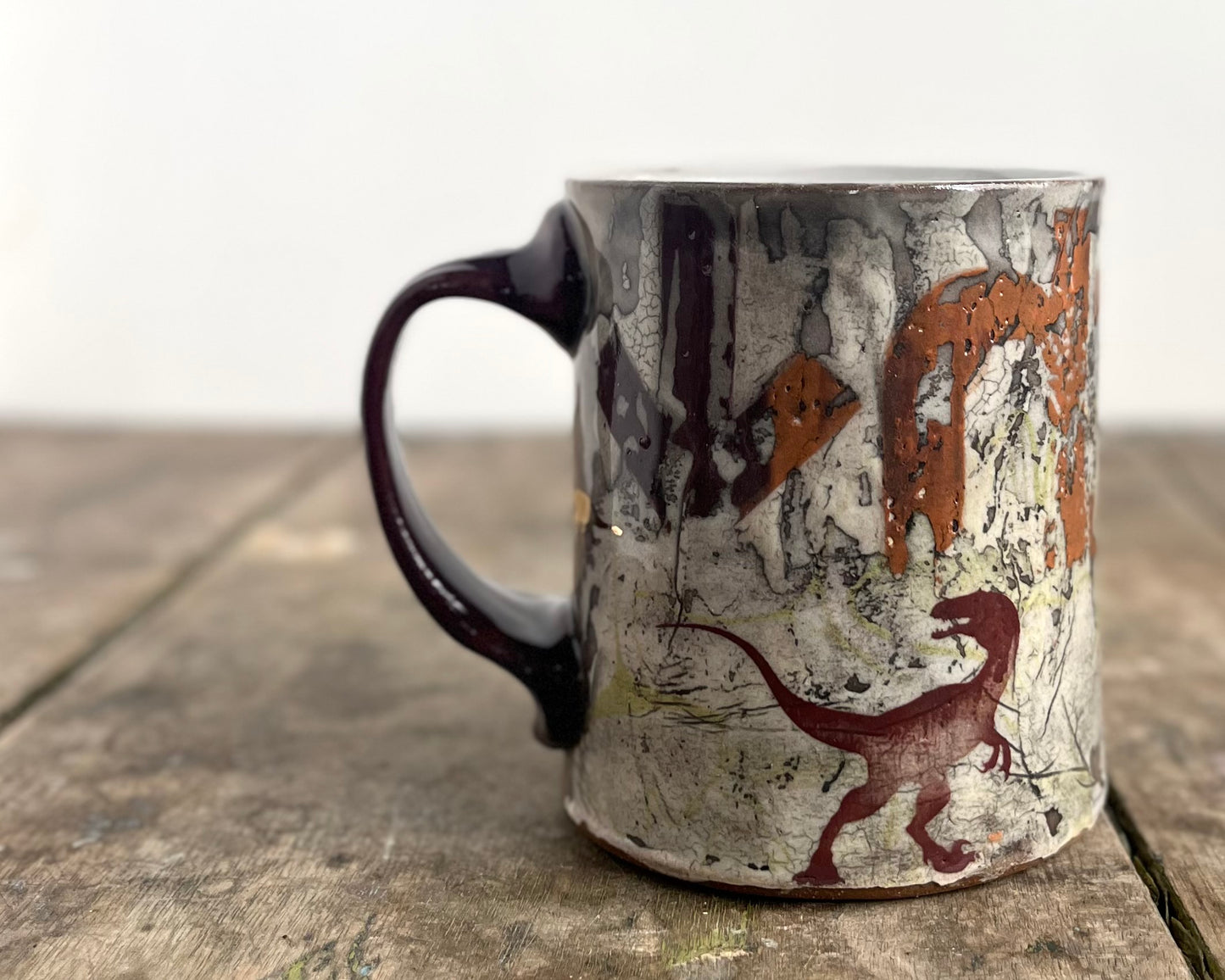 Mug with slip, gold decals and image transfer