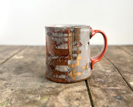 Mug with slip, gold decals and image transfer
