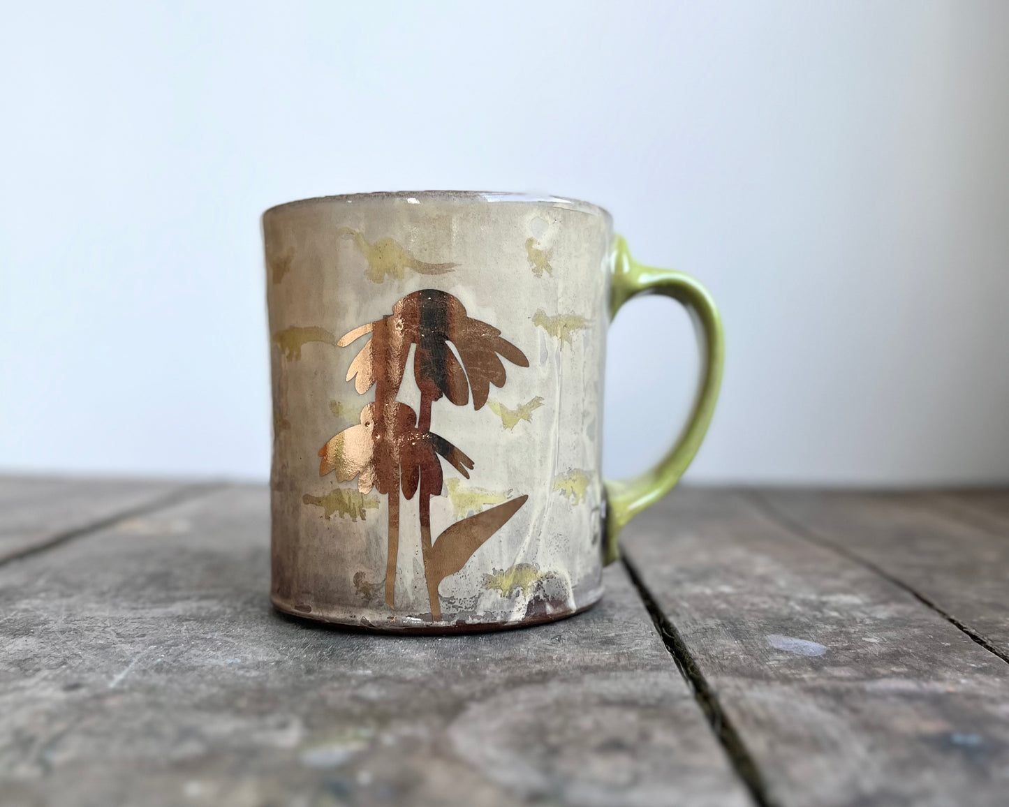 Mug with slip, gold decals and image transfer