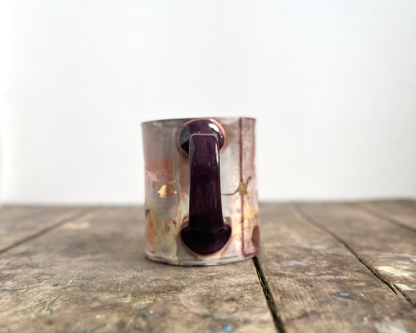 Mug with slip, gold decals and image transfer