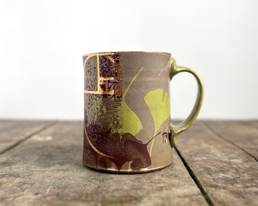 Mug with slip, gold decals and image transfer