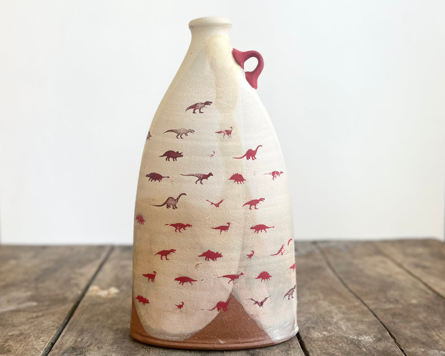 Flattened Vase with Red Dinosaurs
