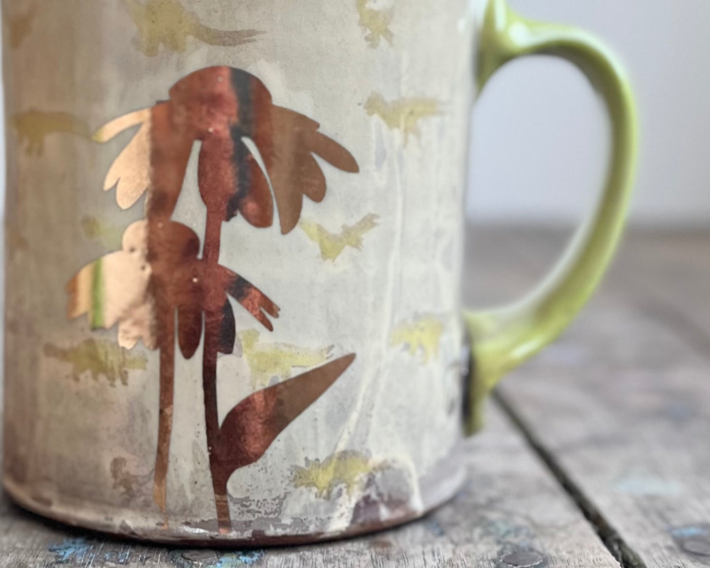 Mug with slip, gold decals and image transfer