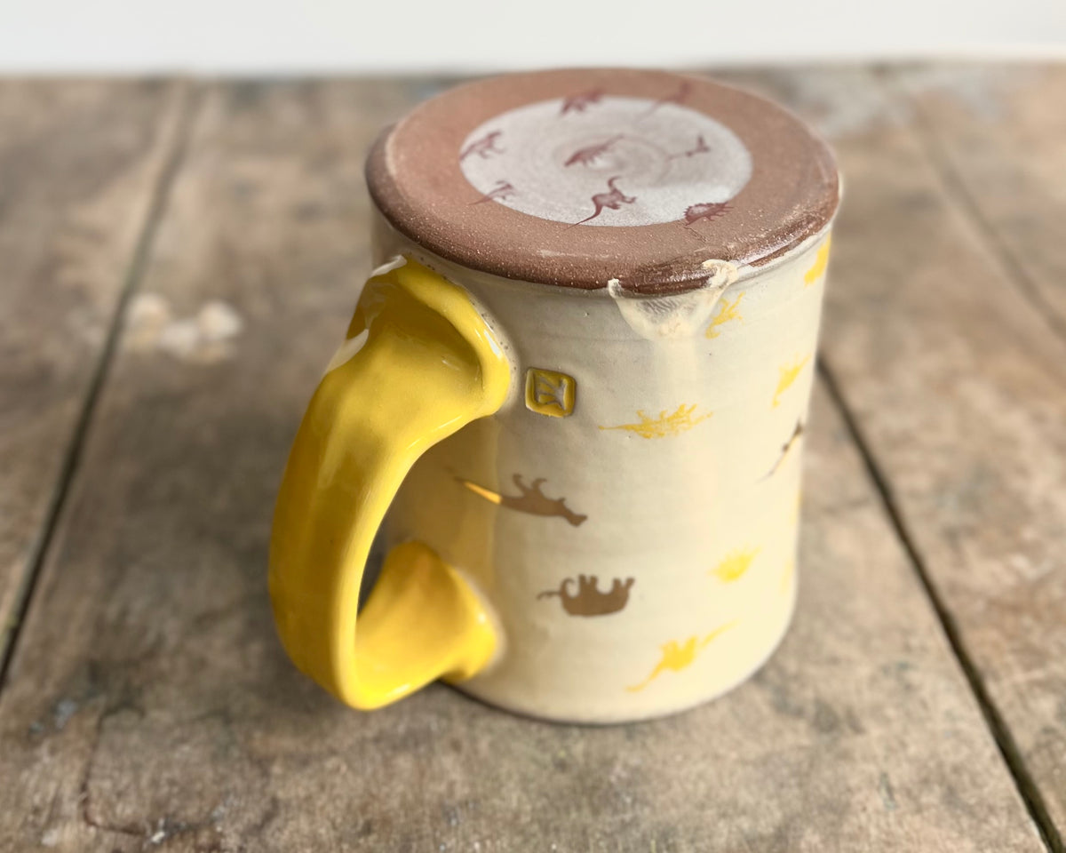 Mug with yellow handle, gold decals and image transfer