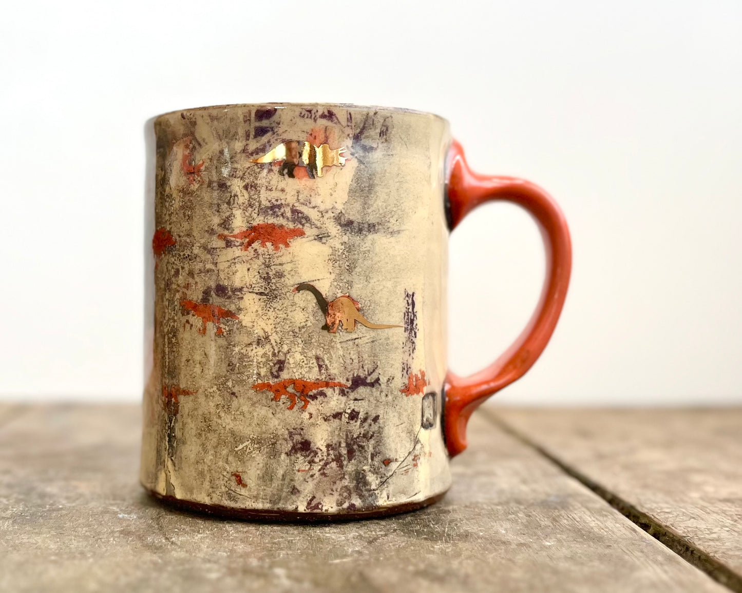 Mug with slip, gold decals and image transfer