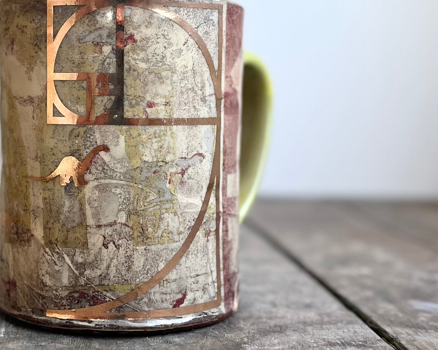 Mug with slip, gold decals and image transfer