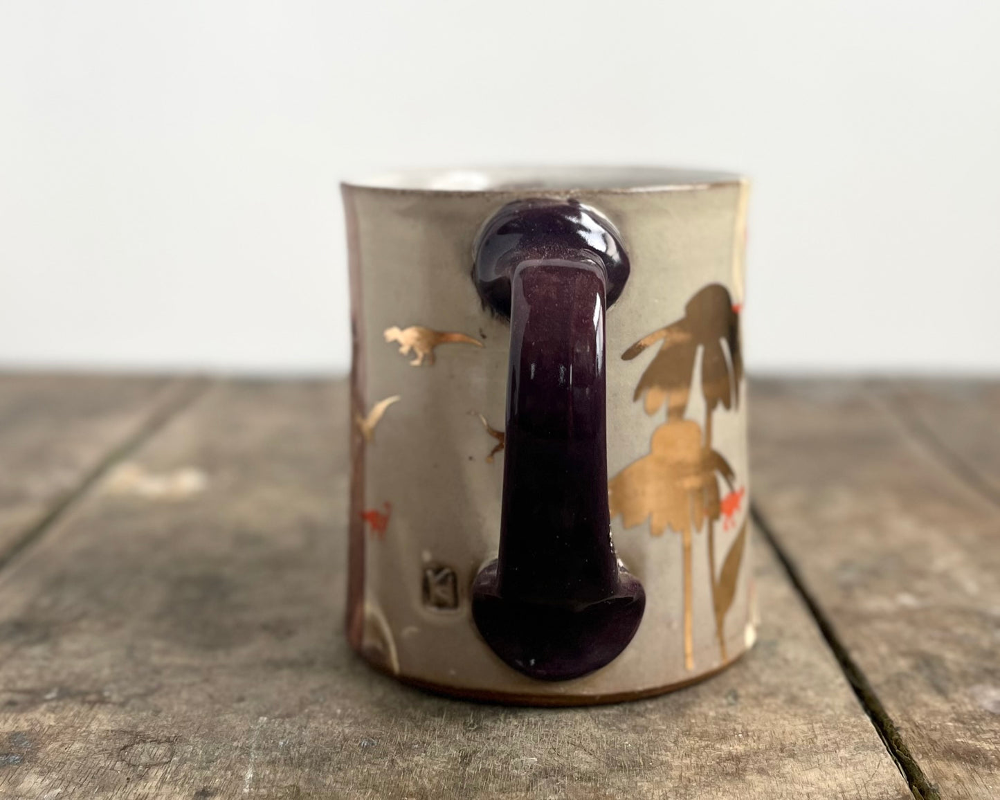 Mug with slip, gold decals and image transfer