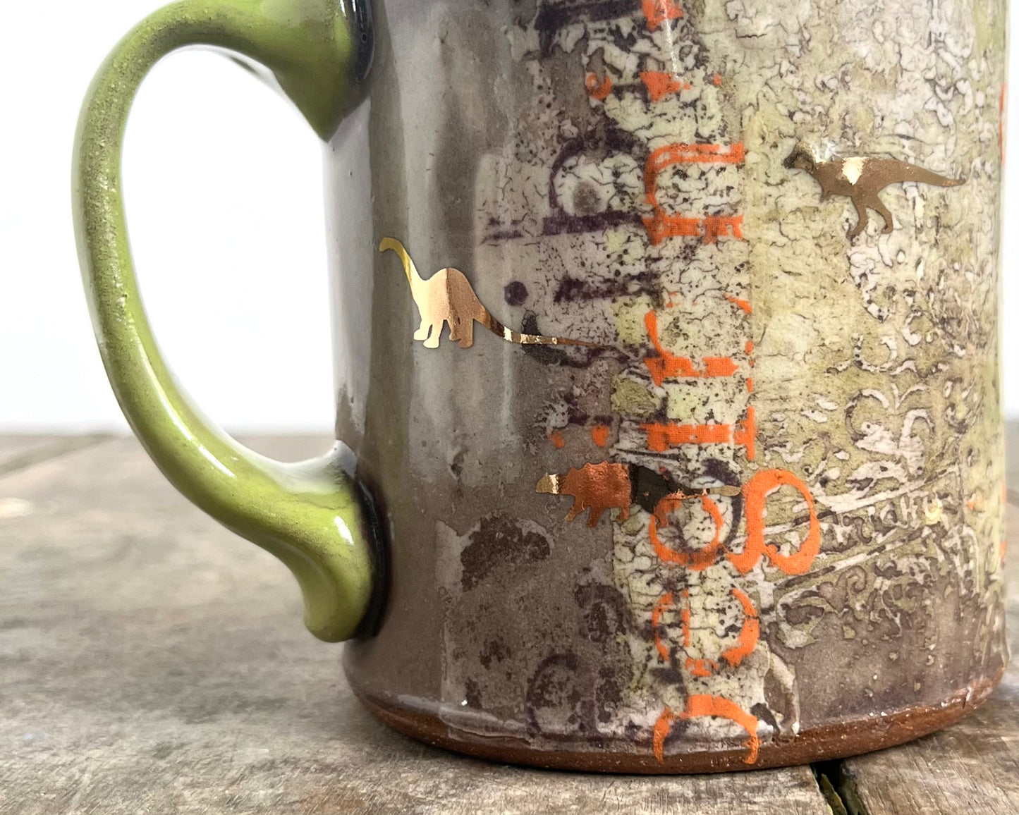 Mug with slip, gold decals and image transfer