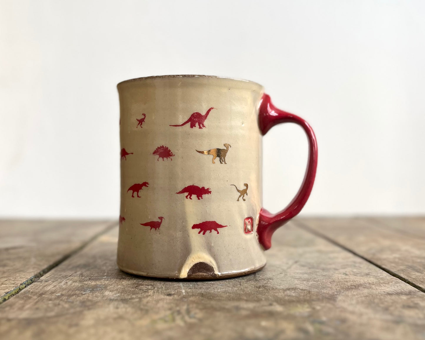 Mug with red handle, gold decals and image transfer