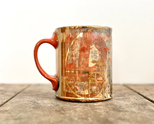 Mug with slip, gold decals and image transfer