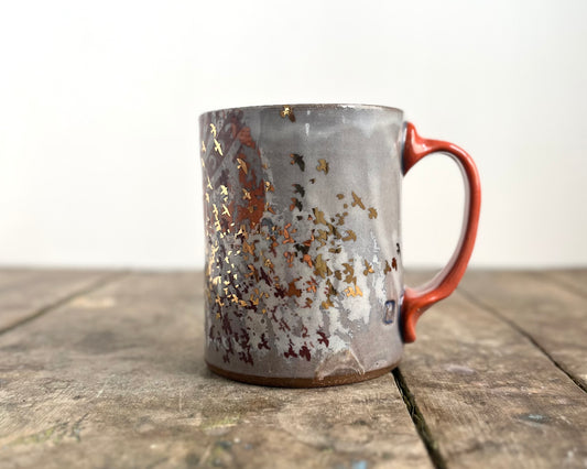 Mug with slip, gold decals and image transfer