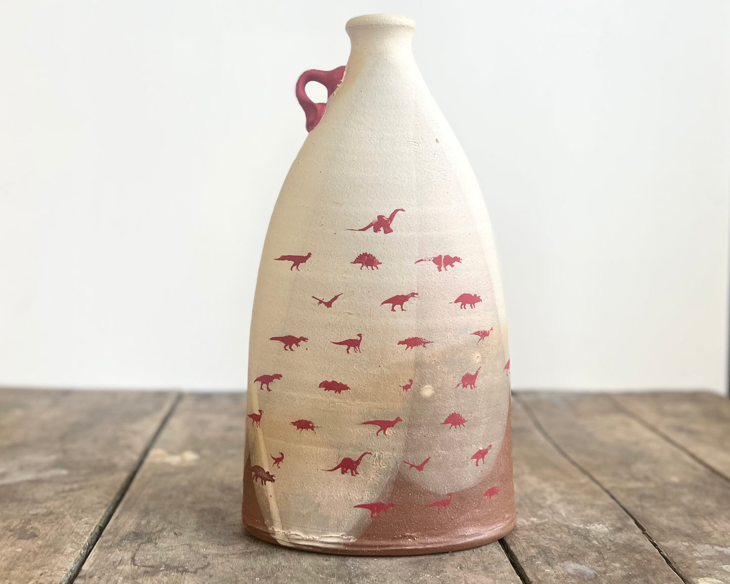 Flattened Vase with Red Dinosaurs