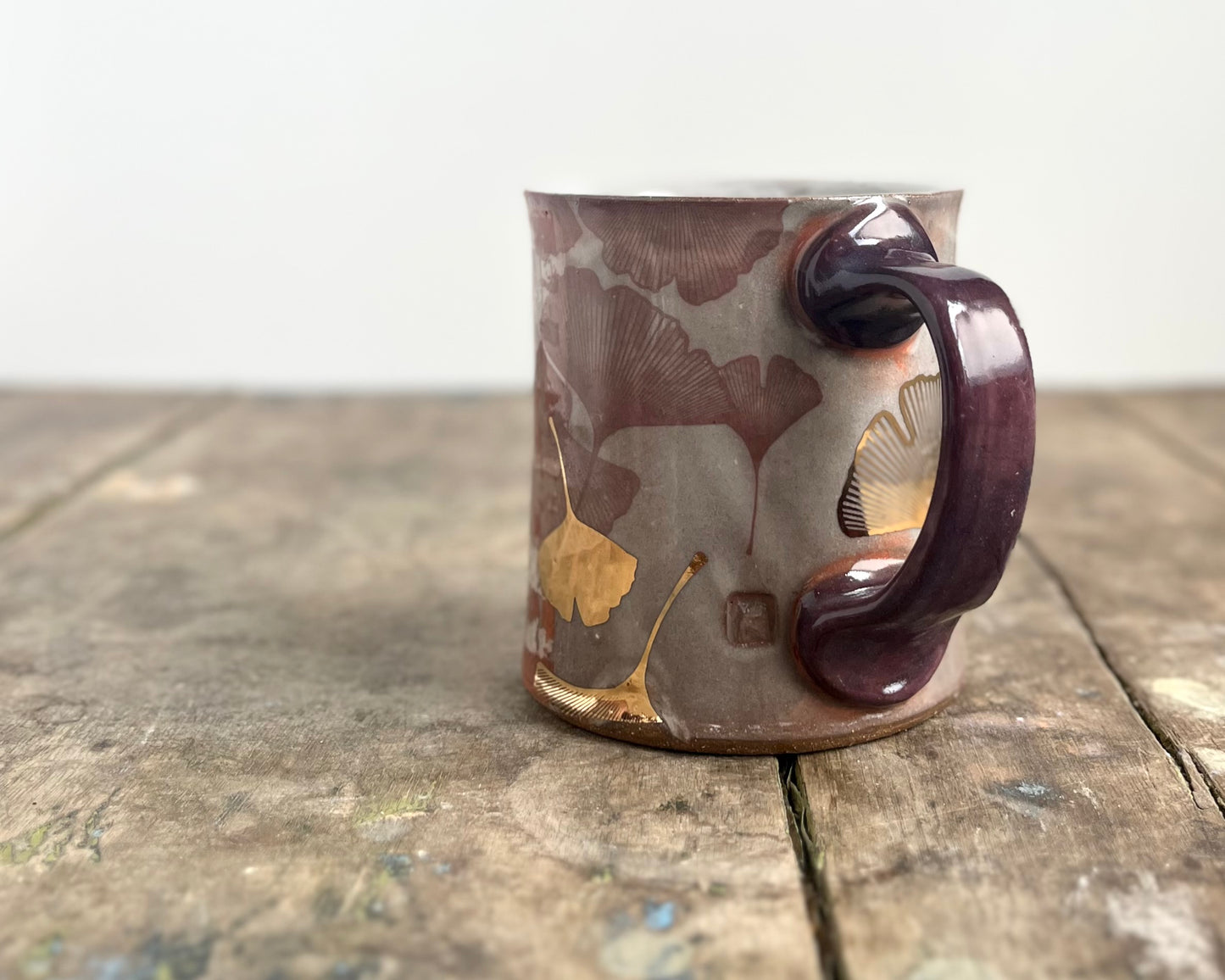 Mug with slip, gold decals and image transfer