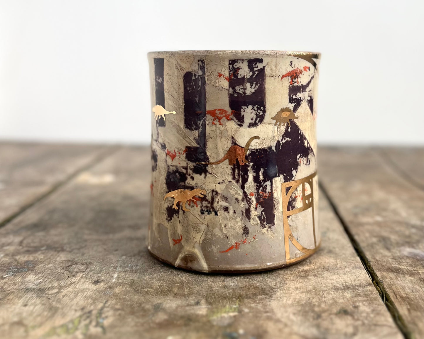 Mug with slip, gold decals and image transfer