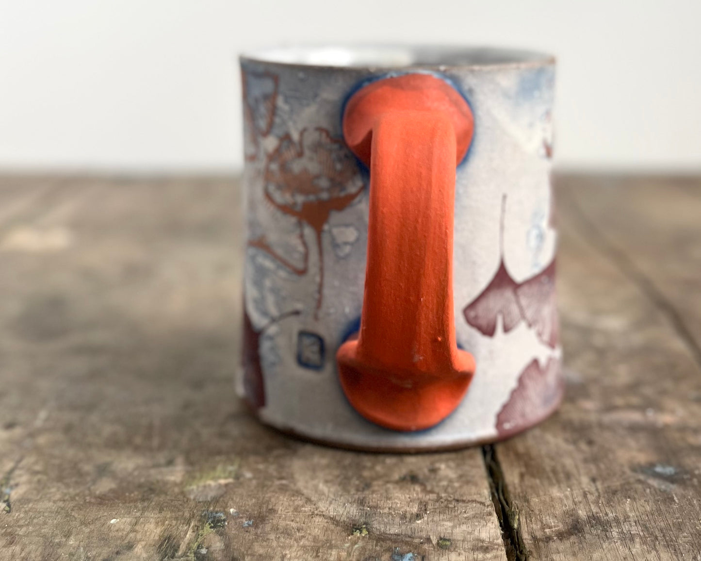 Mug with slip, gold decals and image transfer