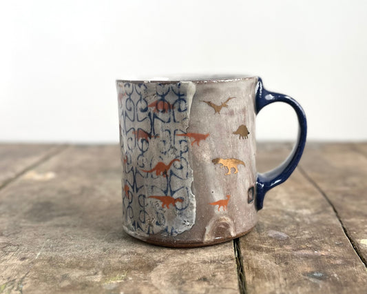 Mug with slip, gold decals and image transfer