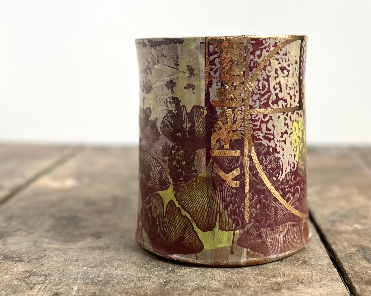 Mug with slip, gold decals and image transfer