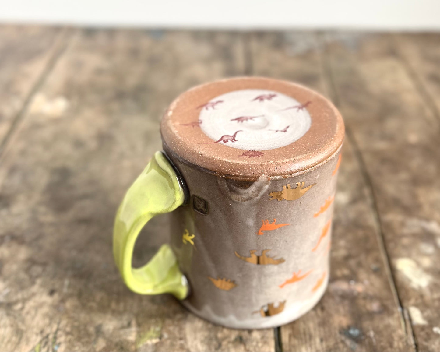 Mug with slip, gold decals and image transfer