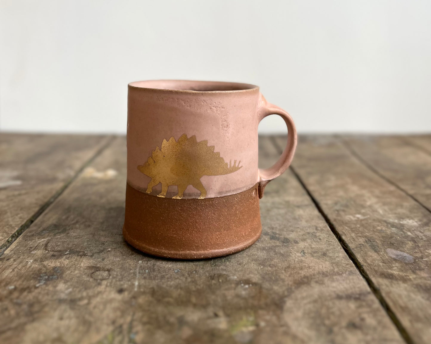 Gold Stegosaurus Americano Mug - pink matte