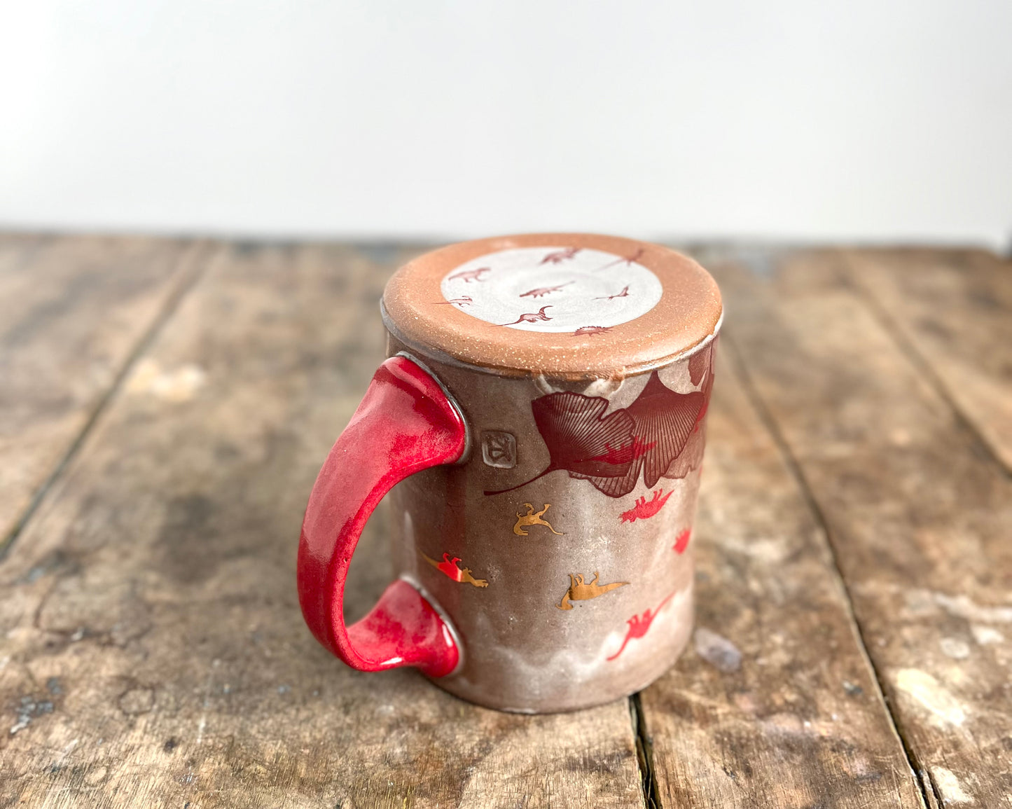 Mug with slip, gold decals and image transfer
