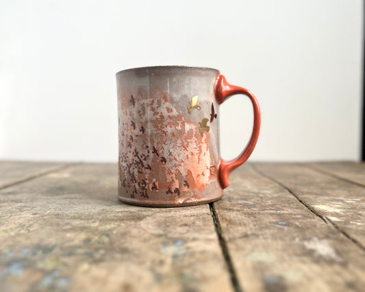 Mug with slip, gold decals and image transfer