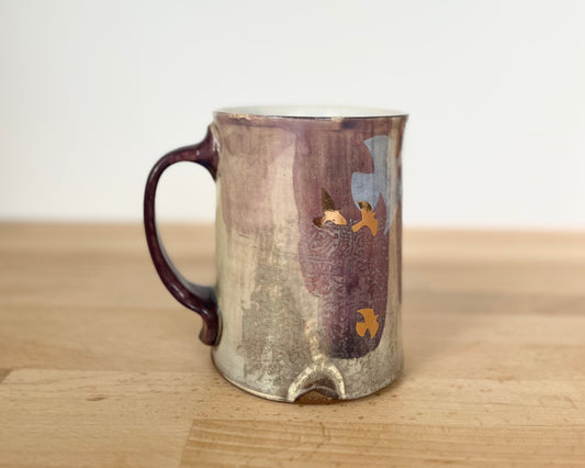 Mug with slip, gold decals and image transfer