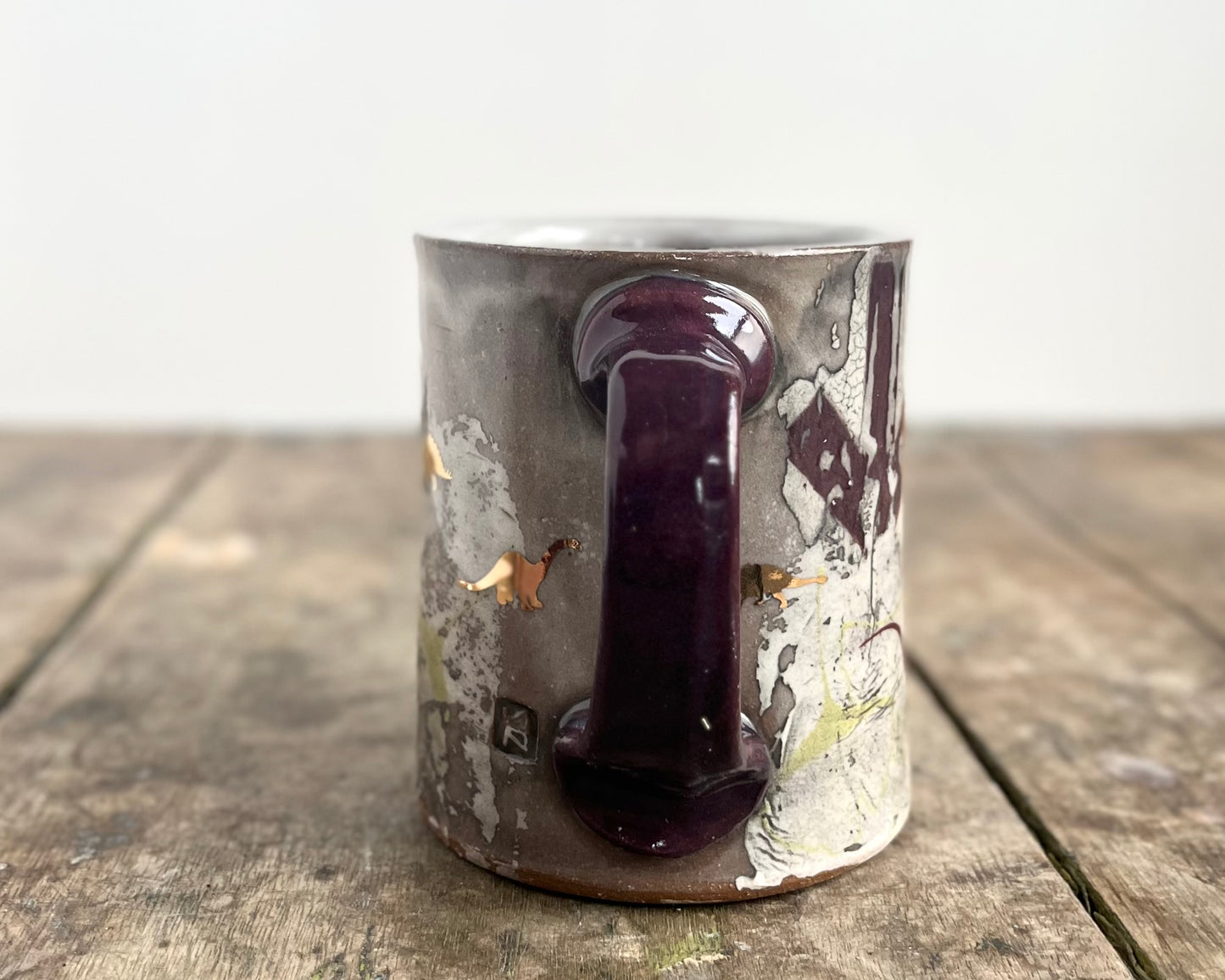 Mug with slip, gold decals and image transfer