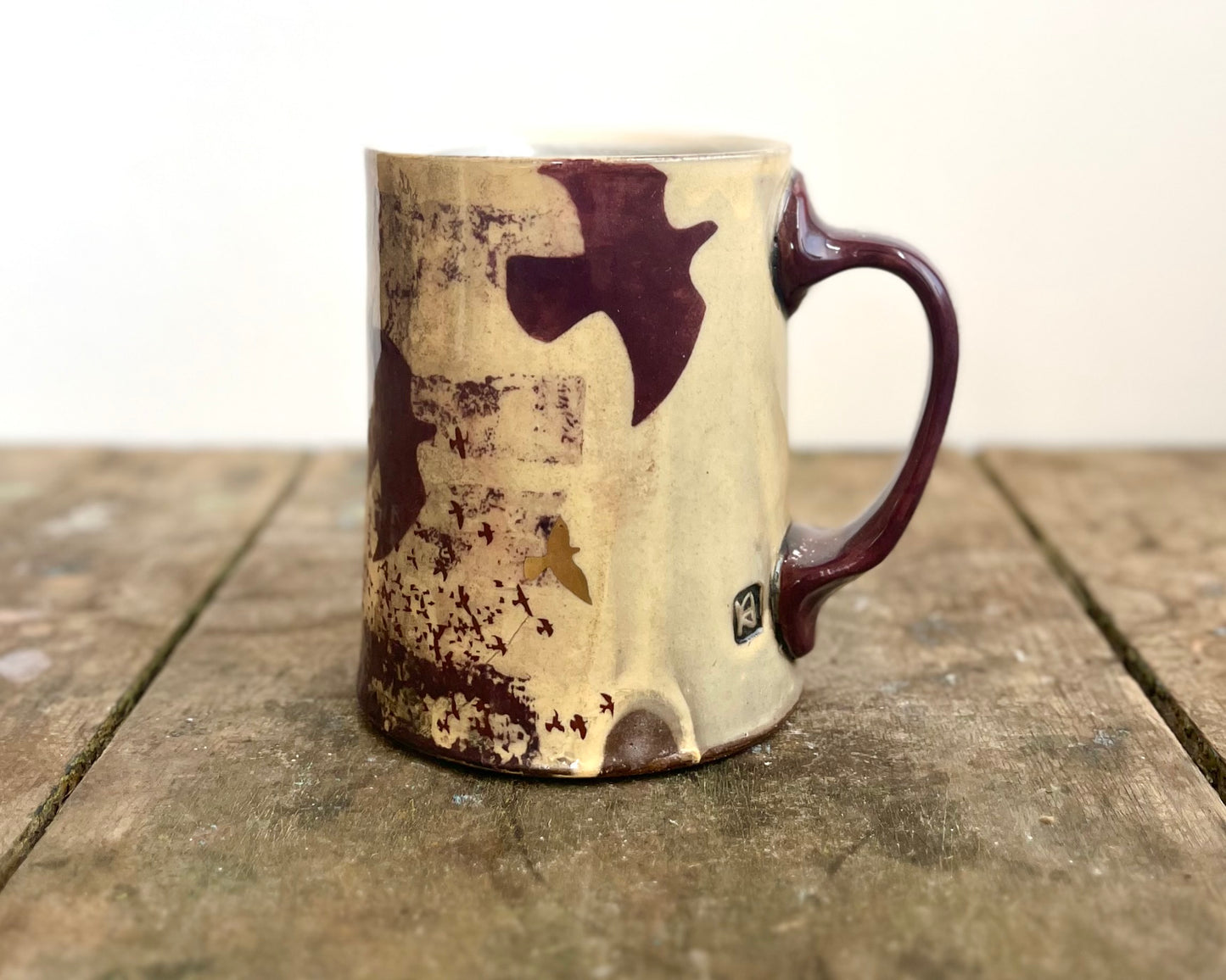 Mug with slip, gold decals and image transfer