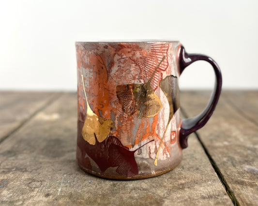 Mug with slip, gold decals and image transfer