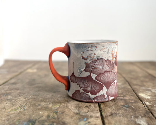 Mug with slip, gold decals and image transfer