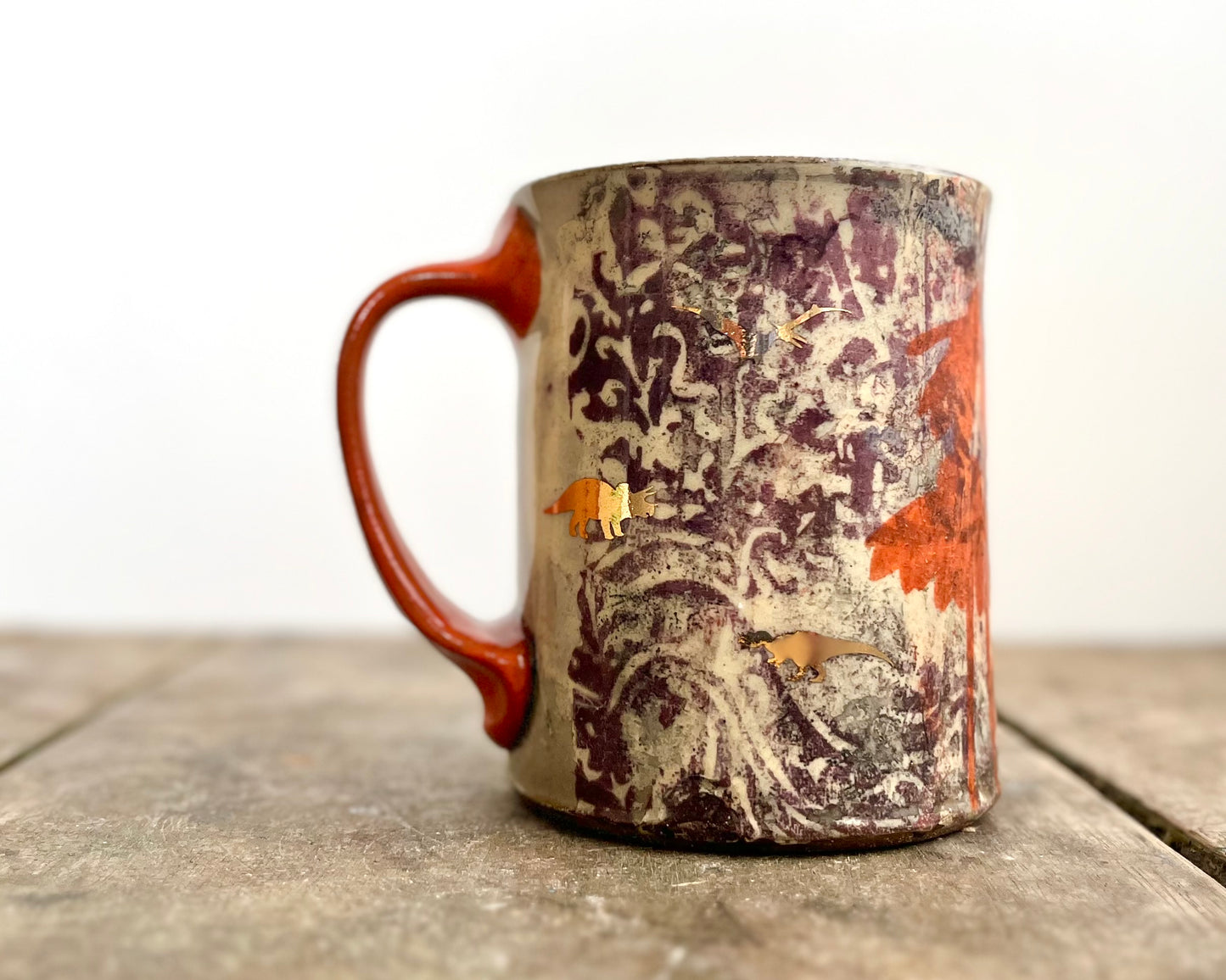 Mug with slip, gold decals and image transfer