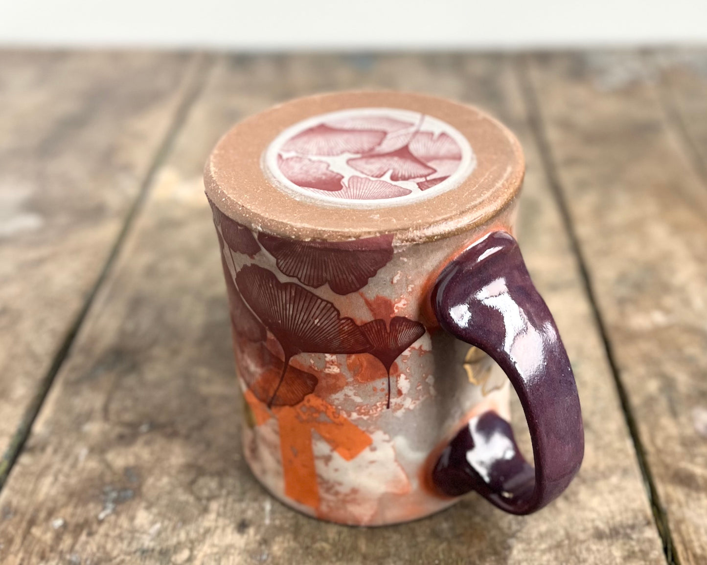 Mug with slip, gold decals and image transfer