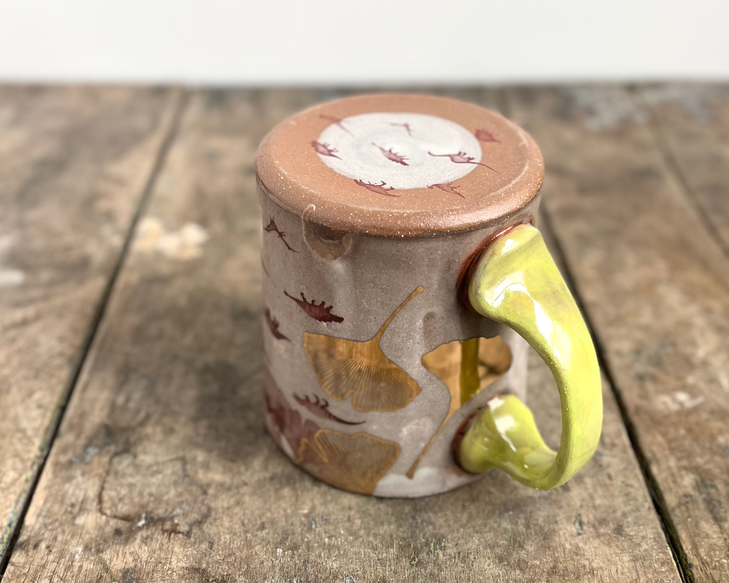 Mug with slip, gold decals and image transfer