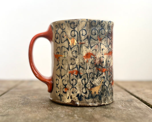 Mug with slip, gold decals and image transfer