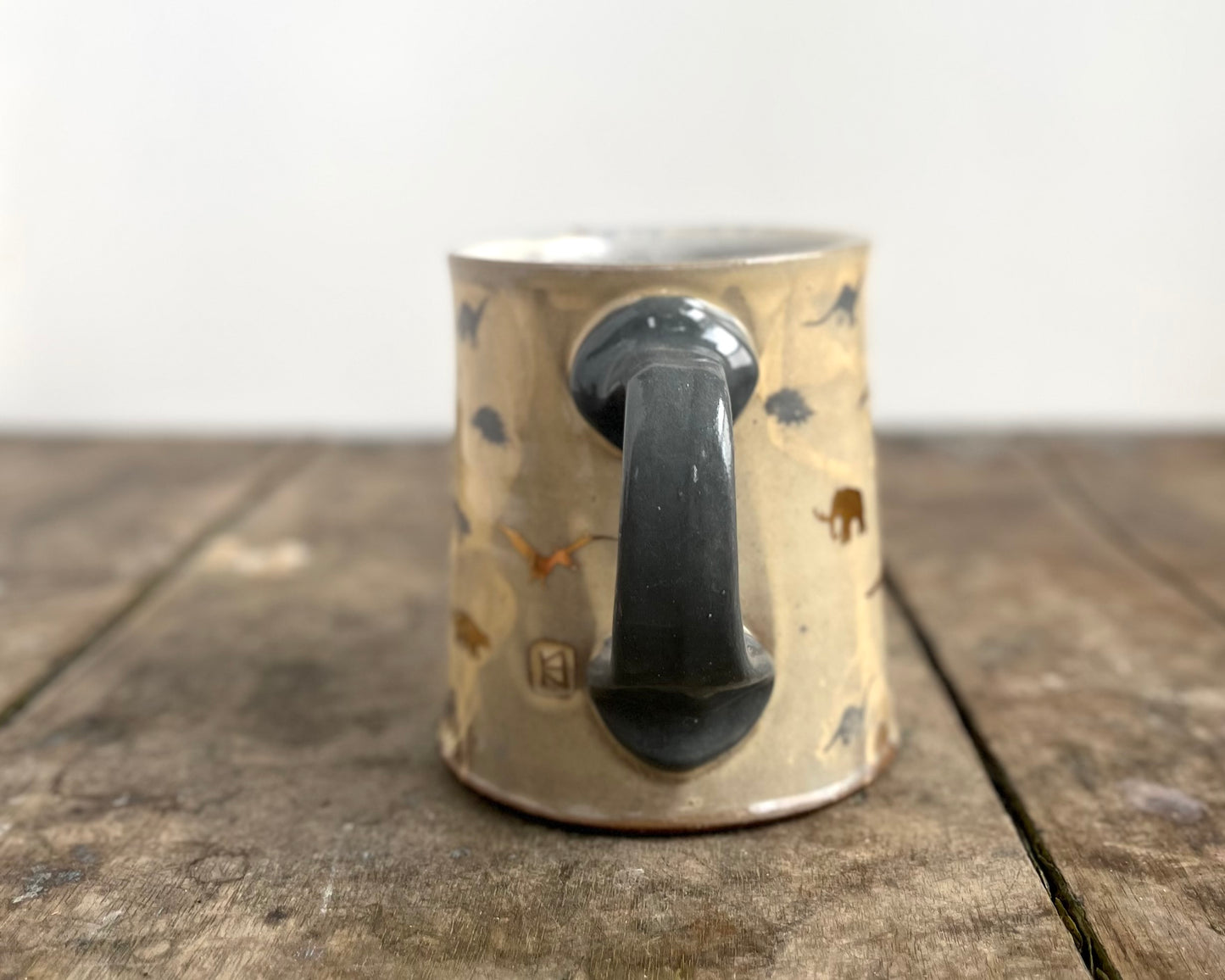 Mug with slip, gold decals and image transfer
