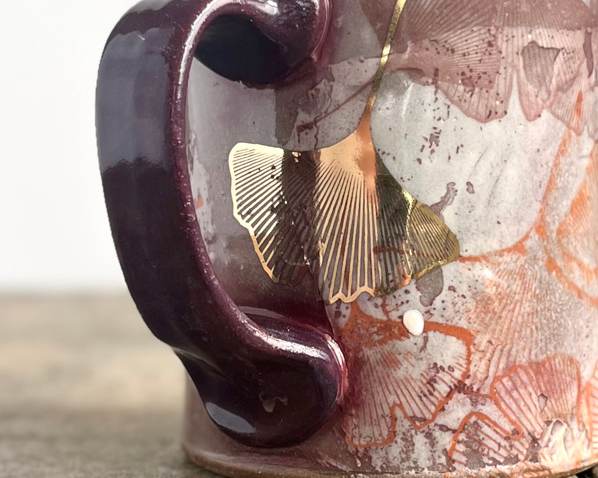 Mug with slip, gold decals and image transfer