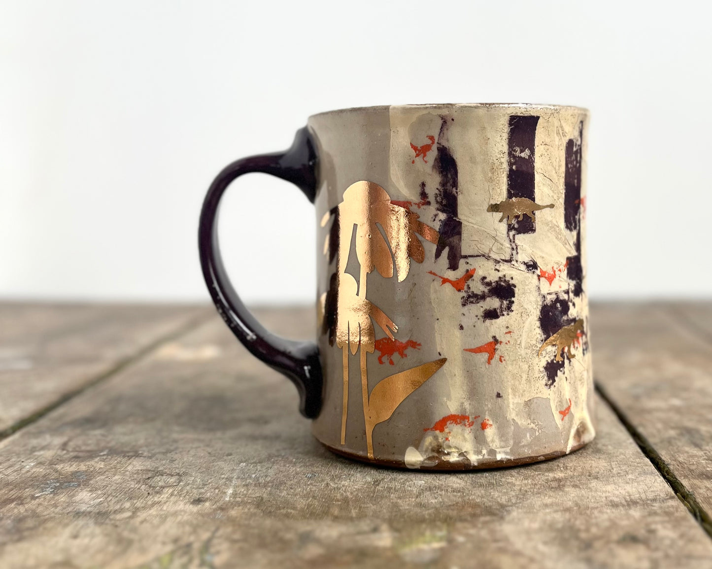 Mug with slip, gold decals and image transfer