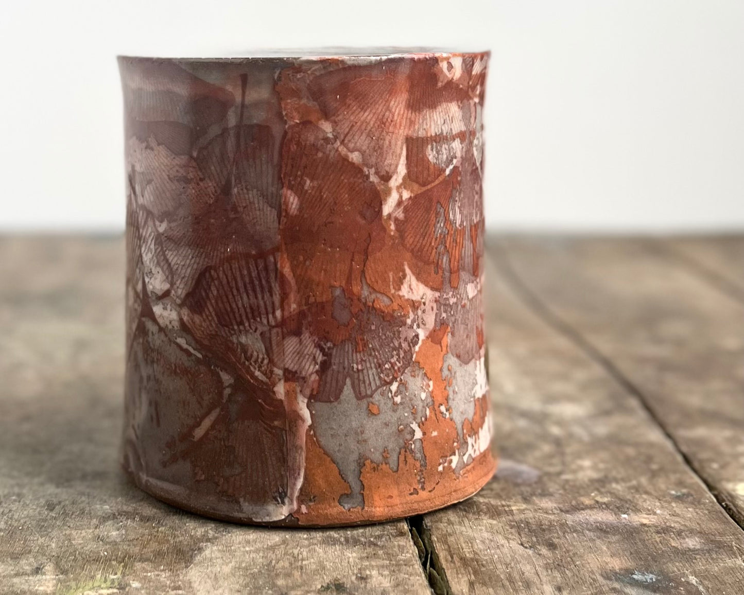Mug with slip, gold decals and image transfer