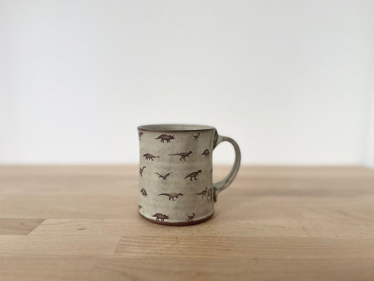 Mug with small dinosaurs - matte grey