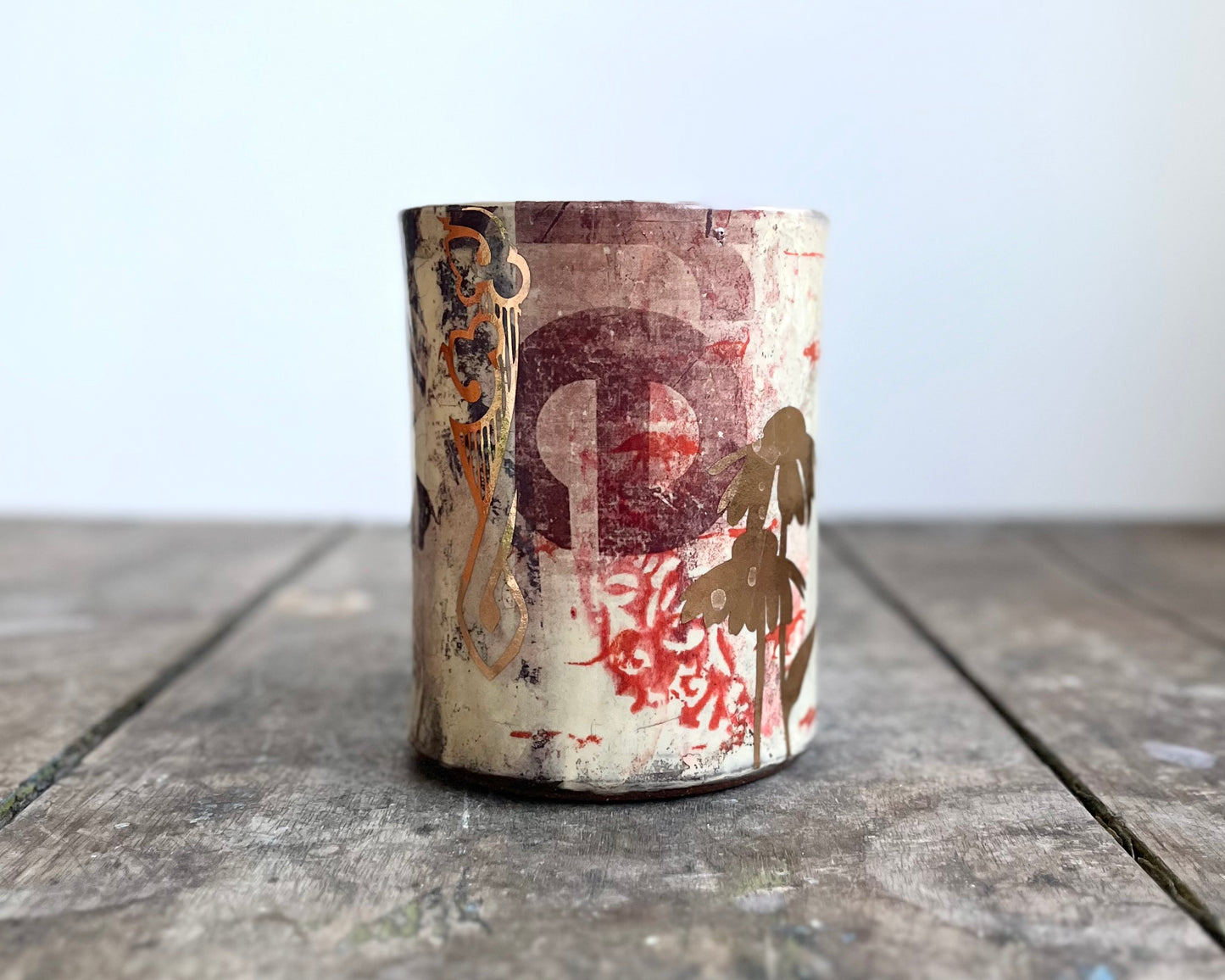 Mug with slip, gold decals and image transfer