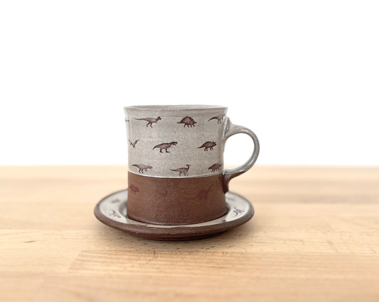 Americano Mug and Saucer with small dinosaurs- white