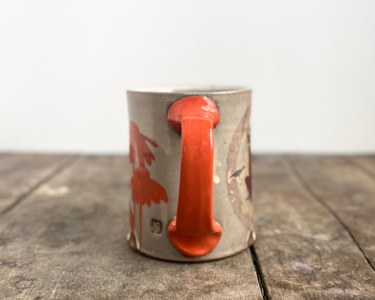 Mug with slip, gold decals and image transfer