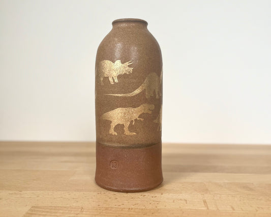 Vase with gold dinosaurs