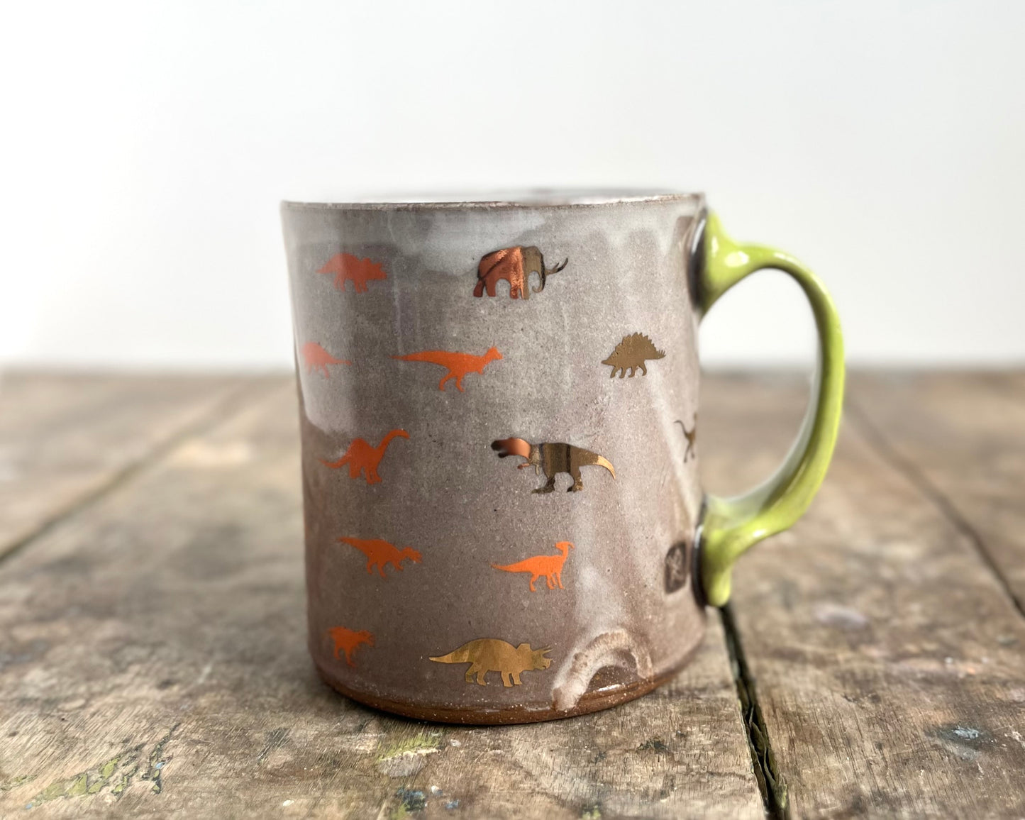 Mug with slip, gold decals and image transfer