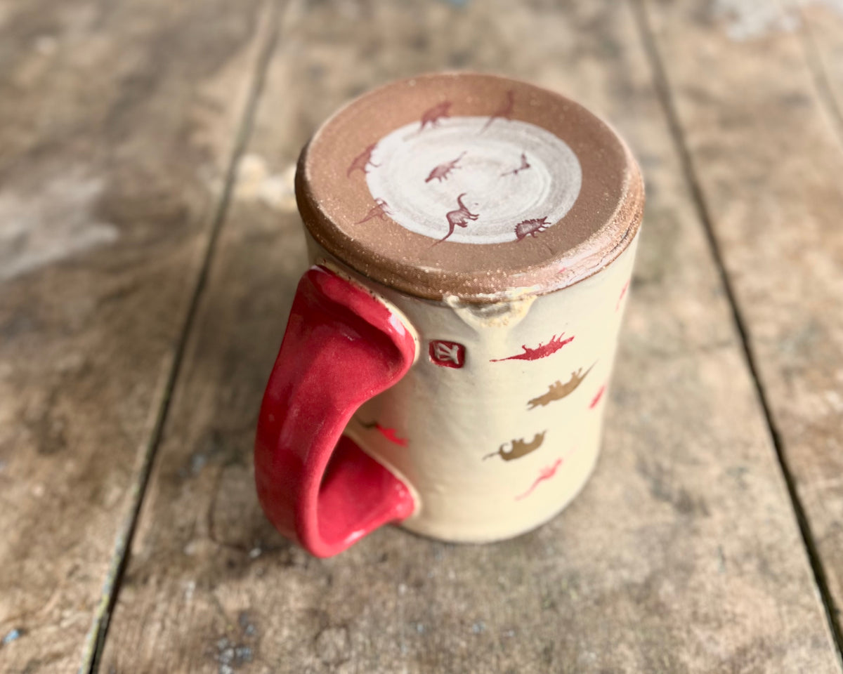 Mug with red handle, gold decals and image transfer