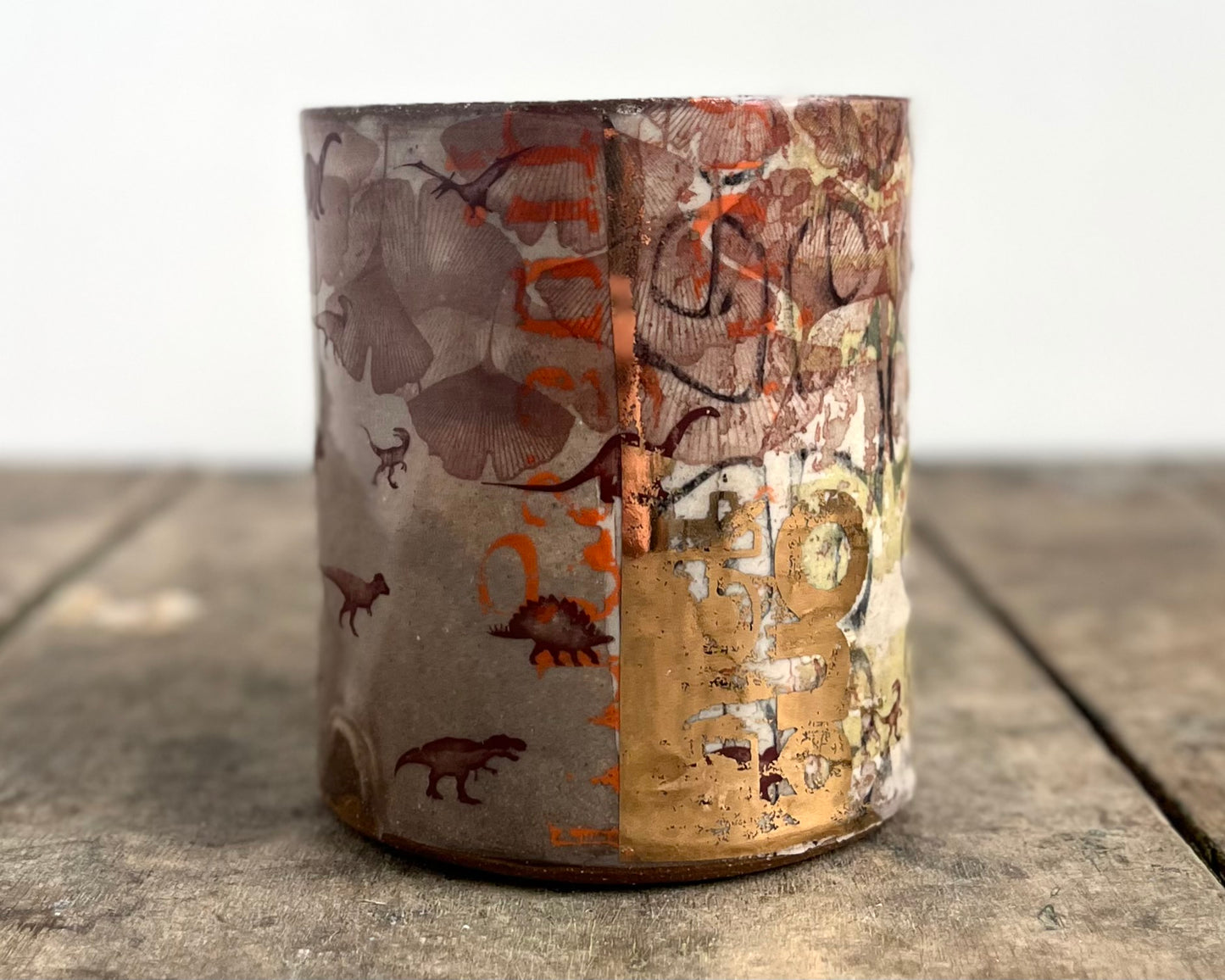 Mug with slip, gold decals and image transfer